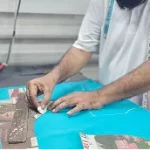 artisan community gathering, diverse group, sharing traditional craft techniques